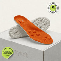 Semelles de massage NyroFit orange sur leur boîte — garantie 30 jours